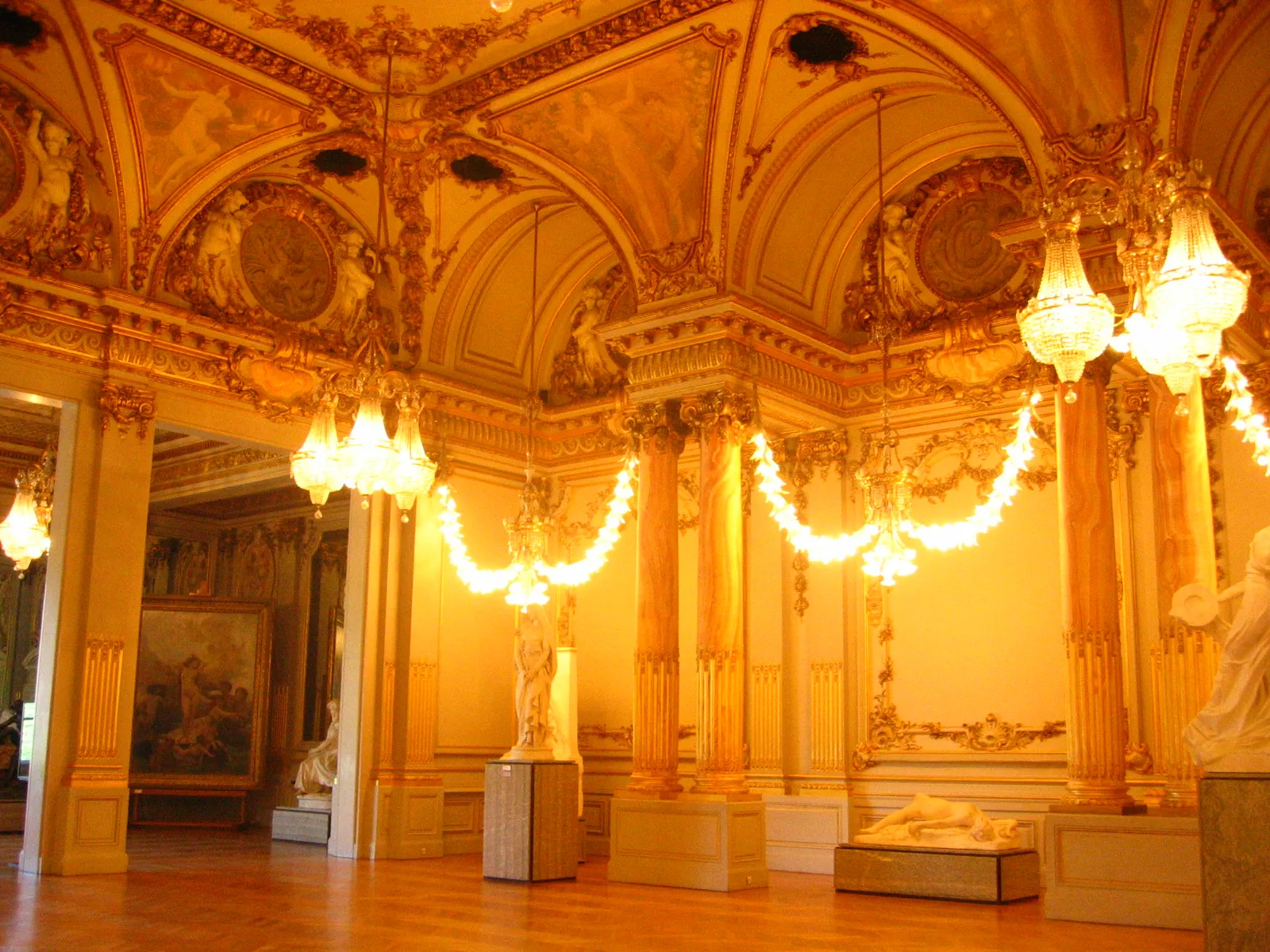 Exhibition lighting highlighting artworks in a gallery space